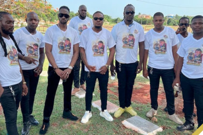 Bounty Killer and Mourners at the Funeral of Boom Dandimite