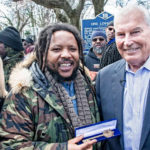 Stephen Marley, flanked by Lieutenant Governor of Delaware Bethany Hall-Long and Mayor Purzycki, holds the key to the city presented to him by Mayor Purzycki at One Love Park/Tatnall Street Park in Wilmington (Photo: Benjamin Chambers/Delaware News Journal)