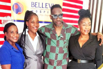 Bounty Killer (center) along with representatives of Bellevue Hospital