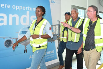 Minister of Energy, Transport and Telecommunications, Hon. Daryl Vaz (second right), engages in discussion with Director General of the Jamaica Civil Aviation Authority (JCAA), Nari Williams-Singh (centre), and Chief Executive Officer of PAC Kingston Airports Limited, Sitara English-Byfield, during a stakeholder tour of Norman Manley International Airport in Kingston on Wednesday (October 29). Photo credit: Rudranath Fraser
