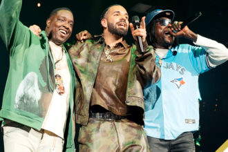 Ricky Plantium, Drake (center) and Vybz Kartel (right) at Scotiabank Arena in Toronto