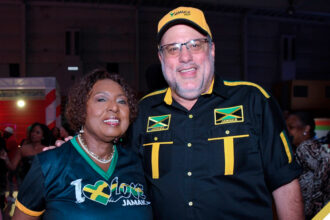 Minister Olivia Grange, Opposition Minister Mark Golding
