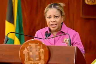 Minister of Education, Skills, Youth and Information, Senator Dr. the Hon. Dana Morris Dixon