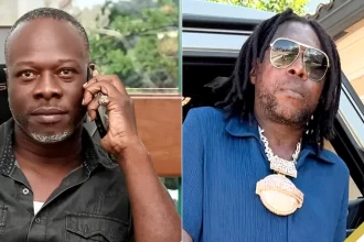 (L-R) Odane Anderson of Jacho Entertainment Ltd, Vybz Kartel